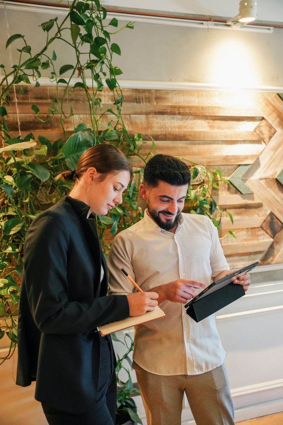 Colleagues Working in Eco-Friendly Office