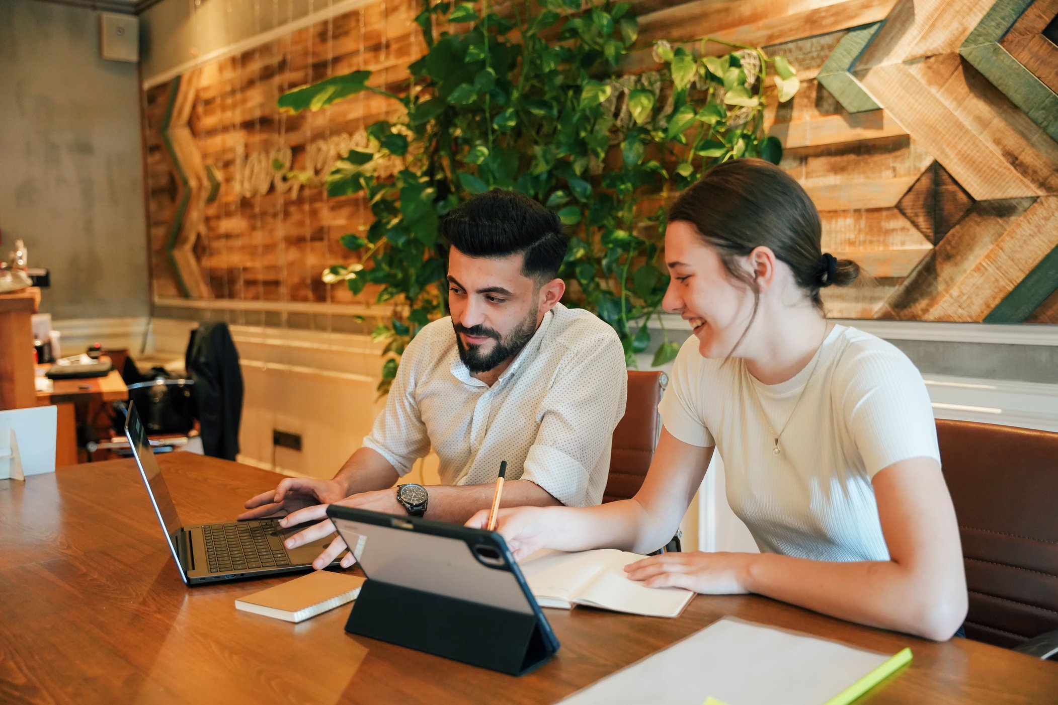 Colleagues Working in Eco-Friendly Office